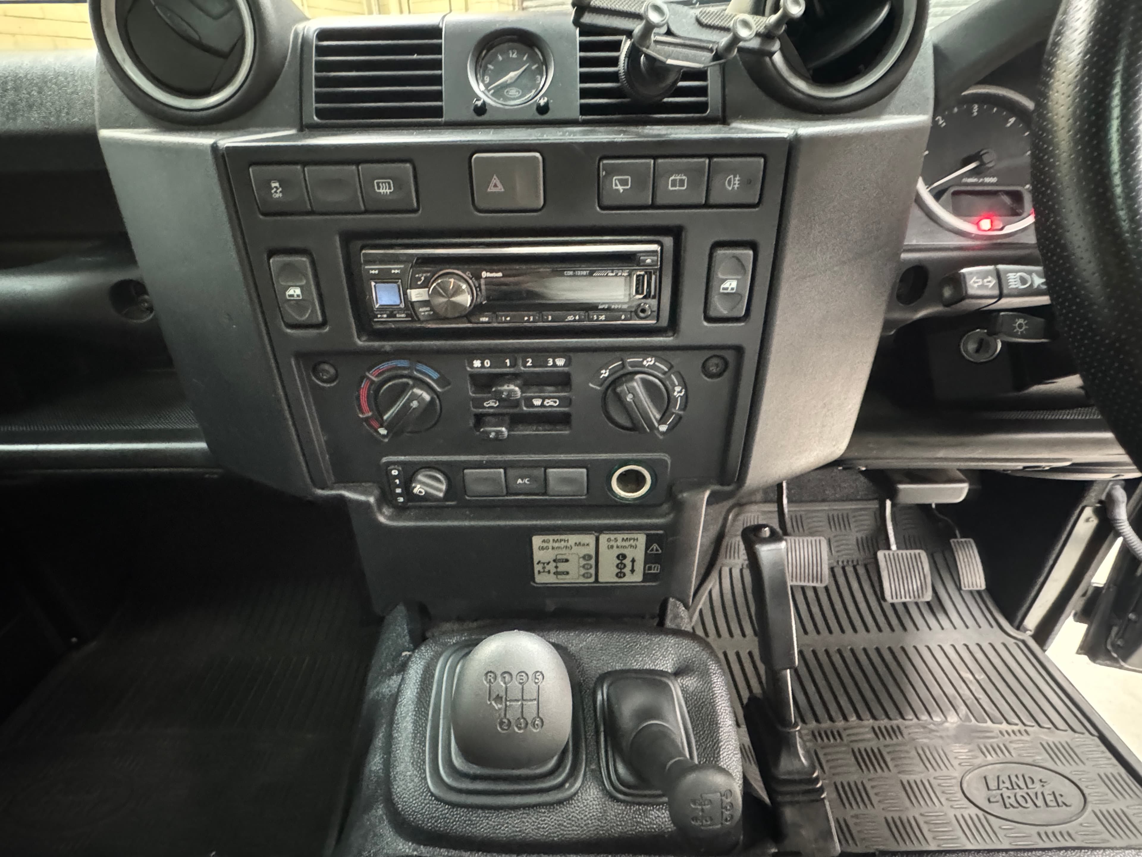 2014 Land Rover Defender DEFENDER 90 MY15 DIESEL TURBO F/INJ 2.2L 6 SP MANUAL in BLACK — rear seats