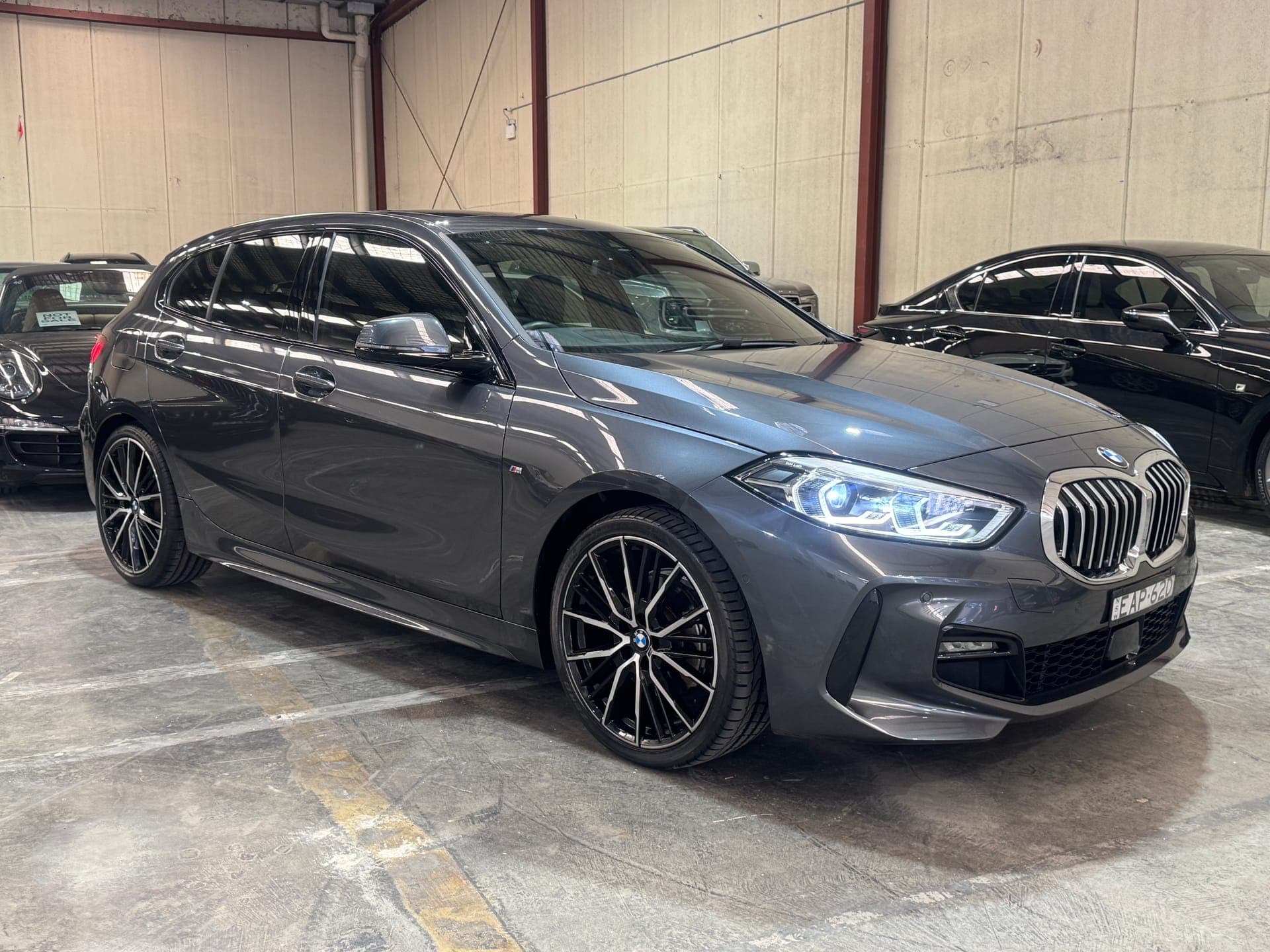 2020 BMW 1 Series 118i M Sport in Mineral Grey — exterior rear