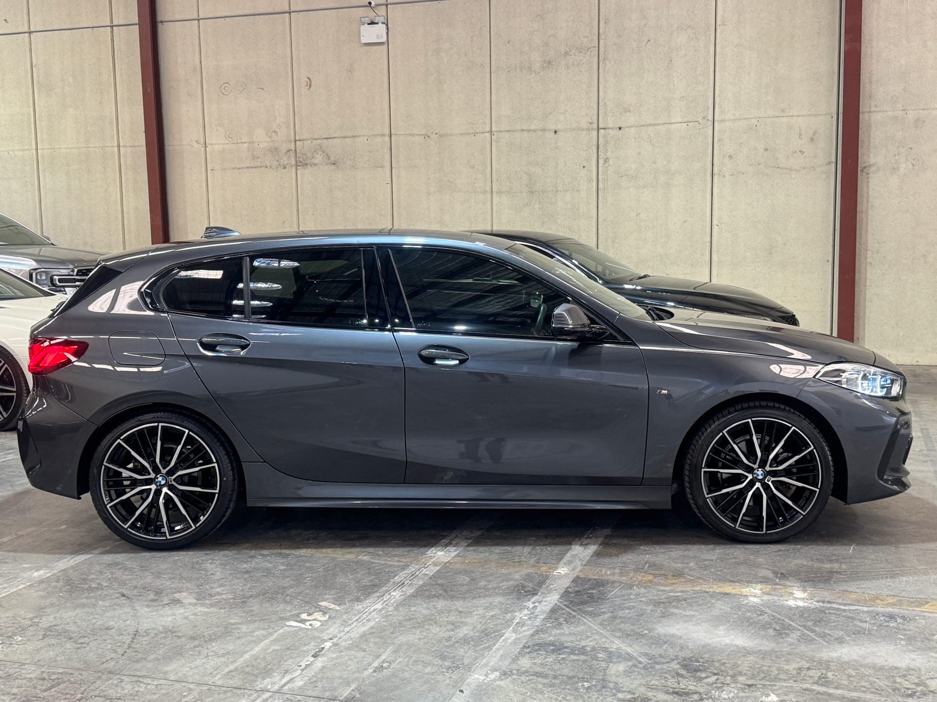 2020 BMW 1 Series 118i M Sport in Mineral Grey — exterior side
