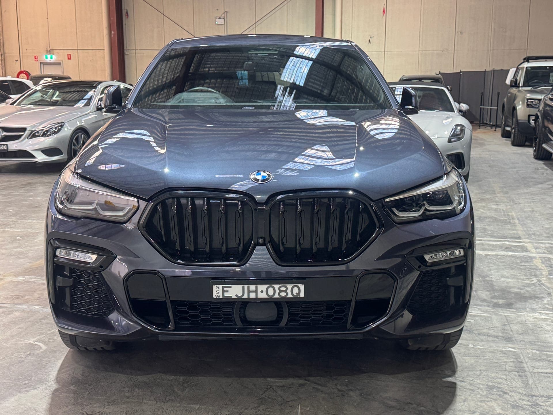2020 BMW X6 xDrive30d M Sport G06 in Grey — exterior side