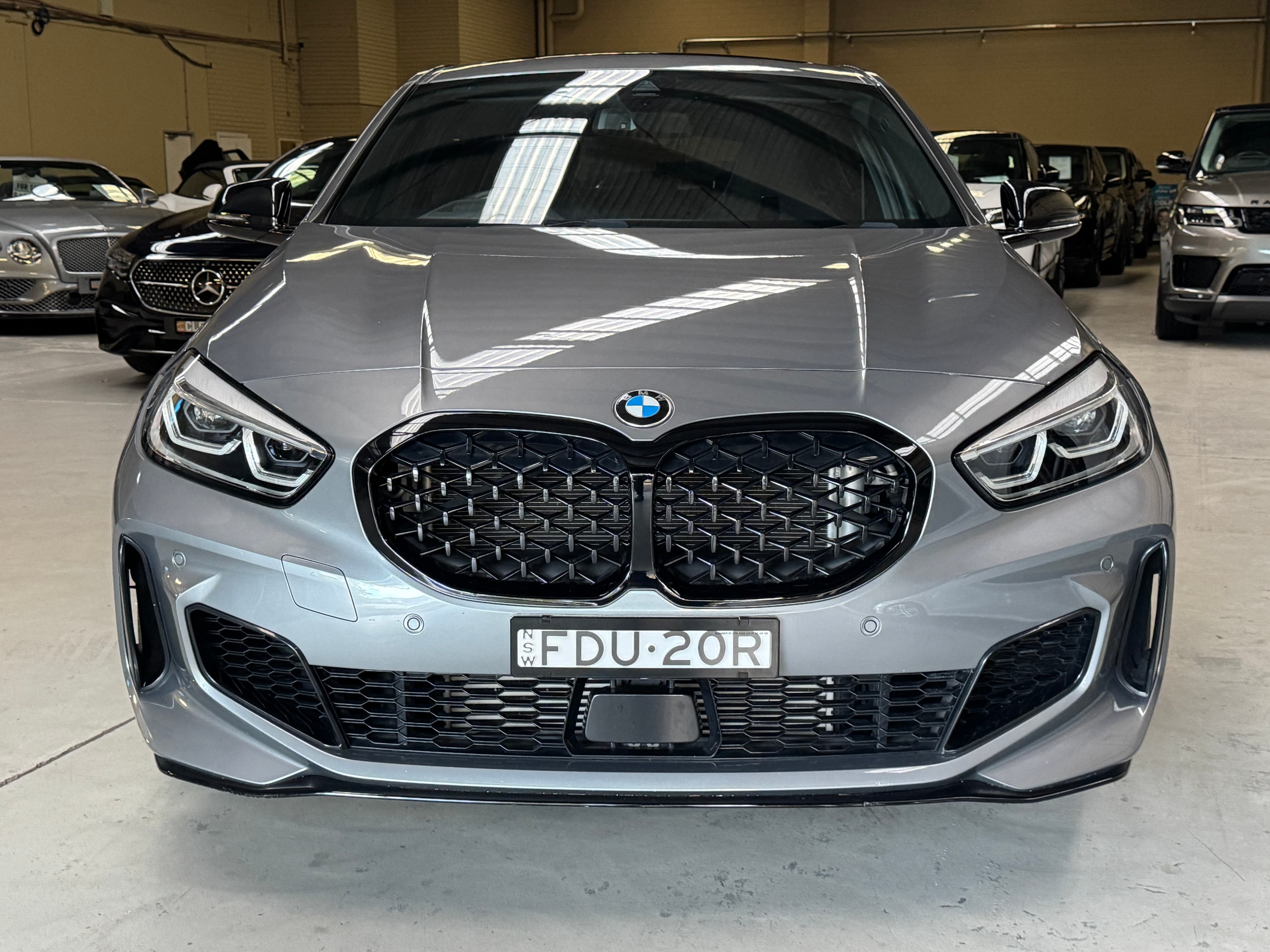 2023 BMW 1 Series M135i xDrive in Grey — exterior side
